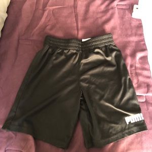 Boys black Puma basketball shorts size 5.